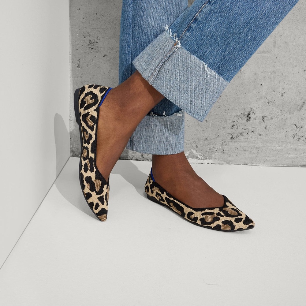 Rothy's Black and Cream Flats with Animal Print